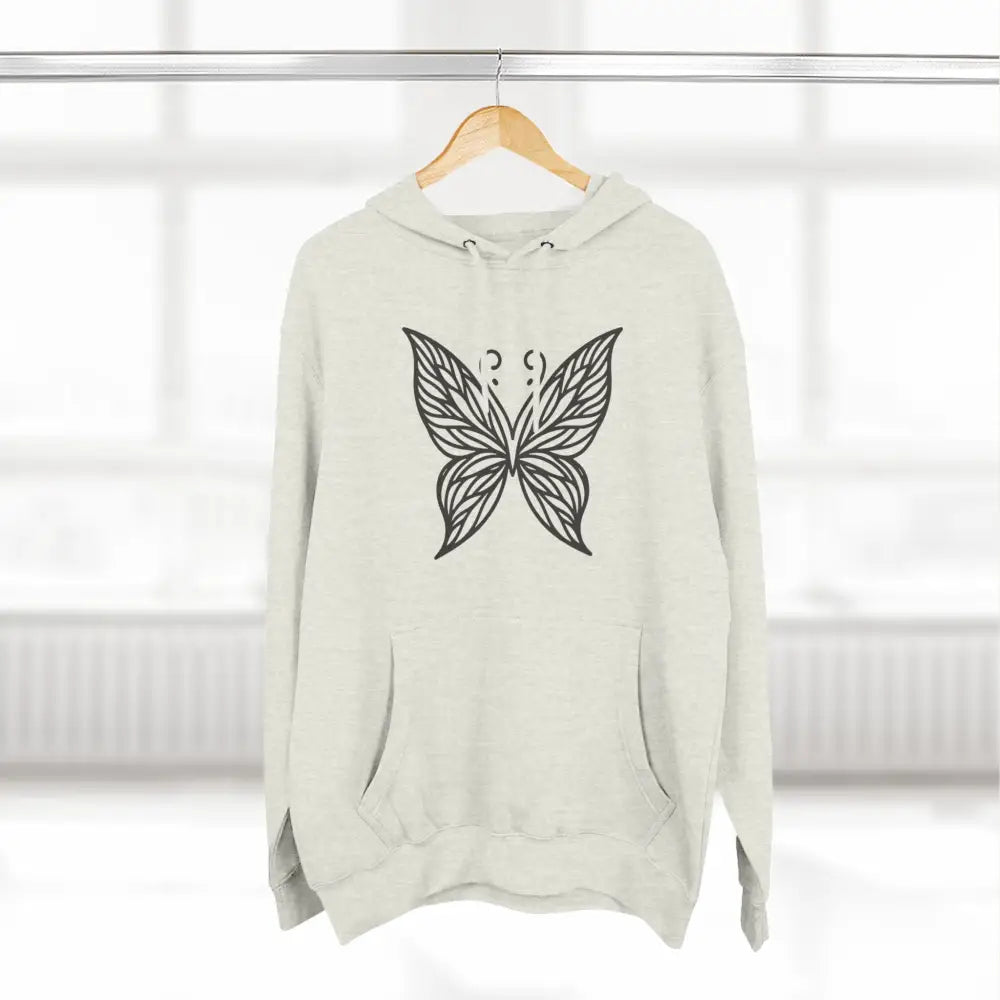 Cream-colored fleece hoodie with black butterfly design, ideal for fall fashion and casual wear