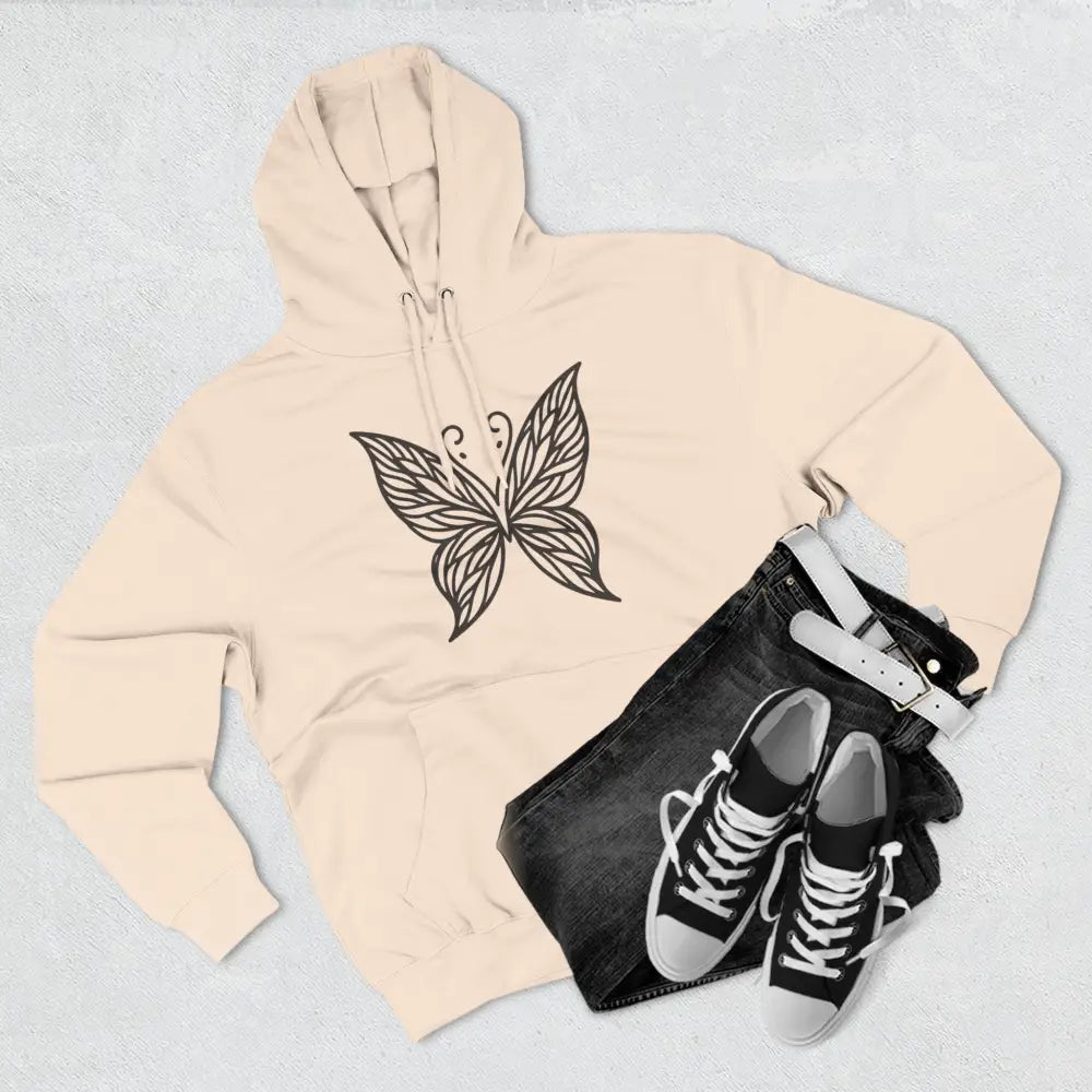 Light peach fleece hoodie with black butterfly design, ideal for fall fashion and casual wear