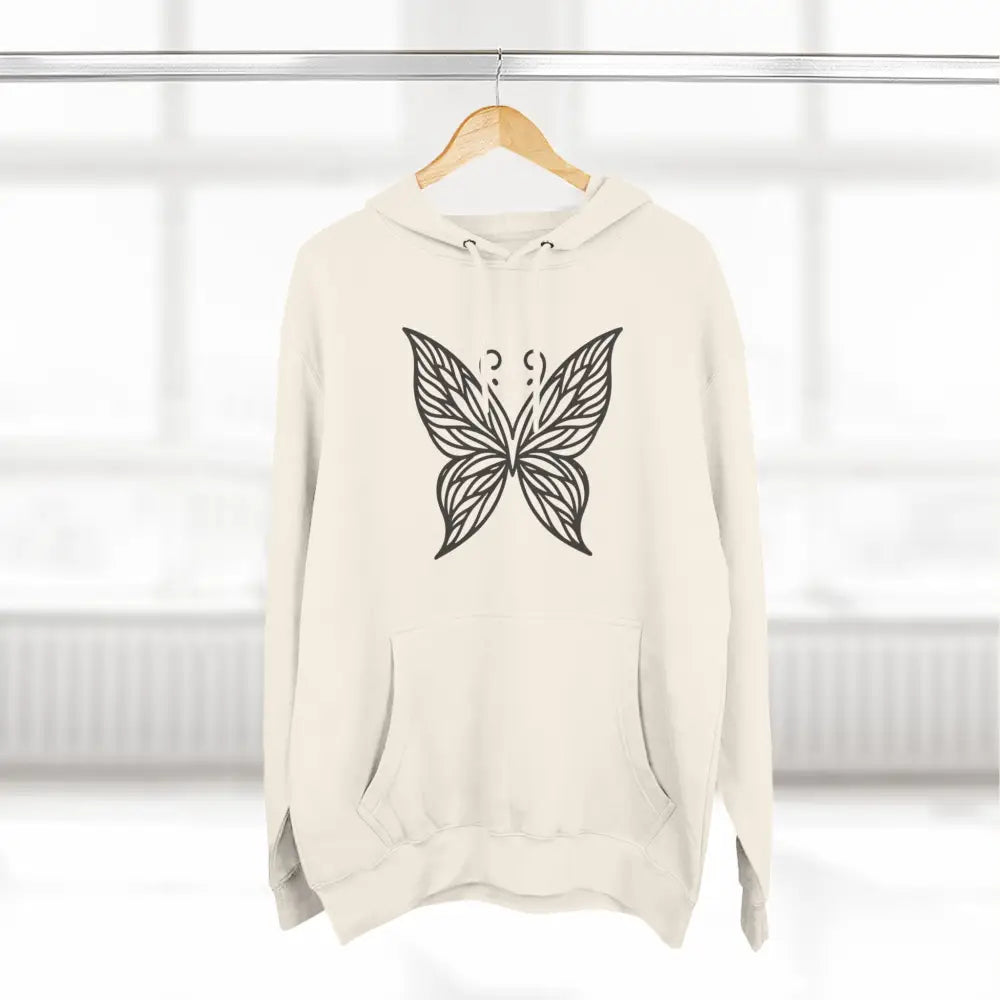 Cream-colored fleece hoodie with black butterfly design, perfect for fall fashion and casual wear