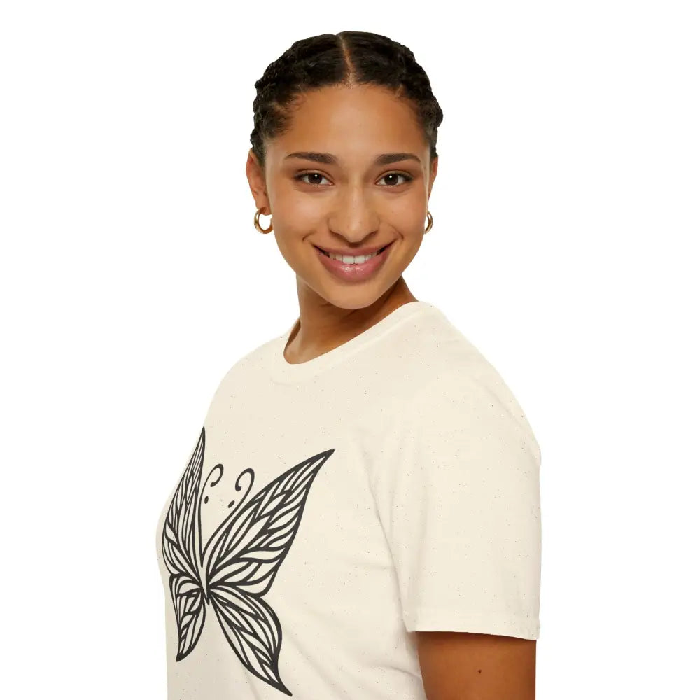 Woman in cream butterfly graphic unisex t-shirt made from lightweight fabric, perfect for spring fashion