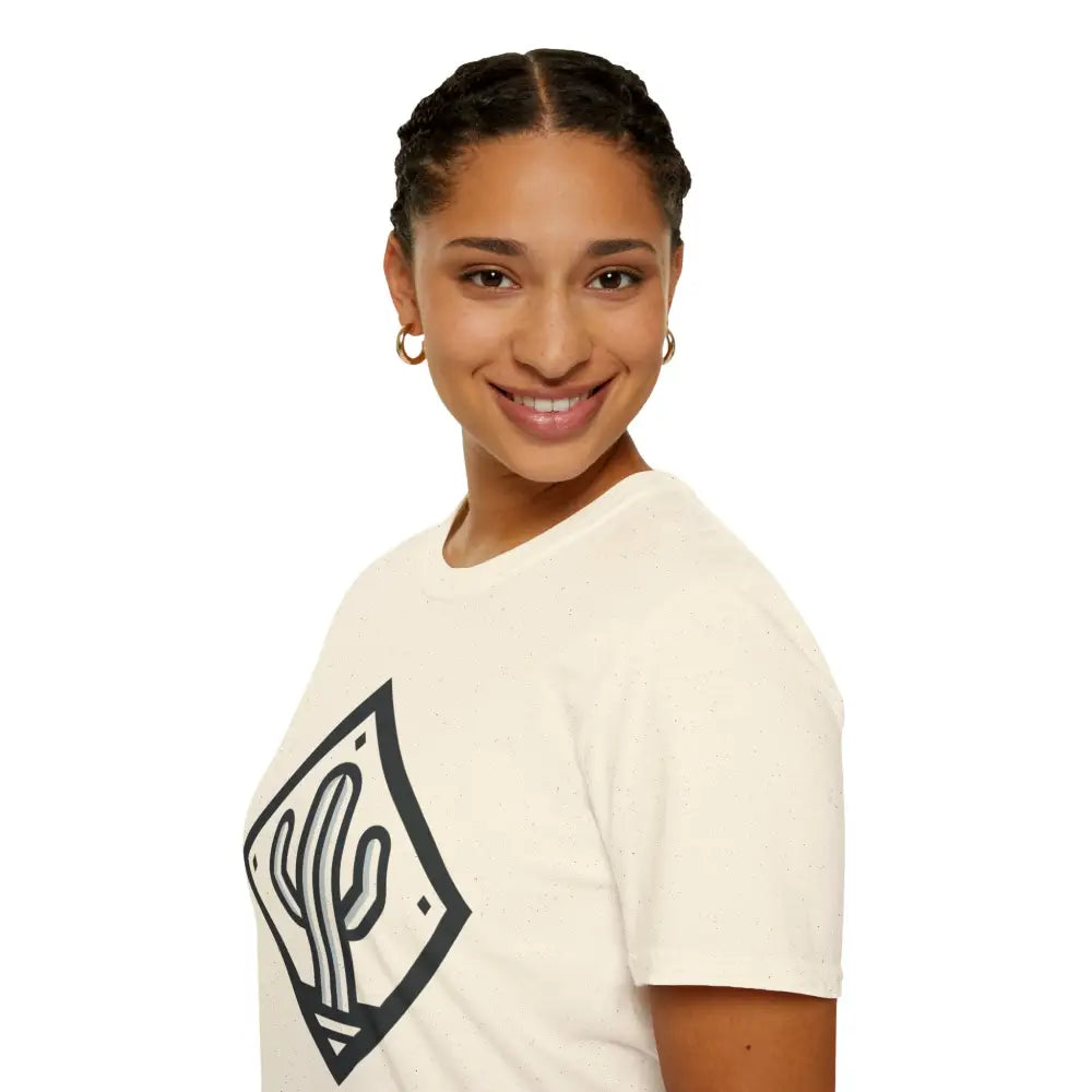 Woman with braided hair and hoop earrings wearing eco-friendly Cactus Adventure T-Shirt made from ring-spun cotton for ultimate comfort