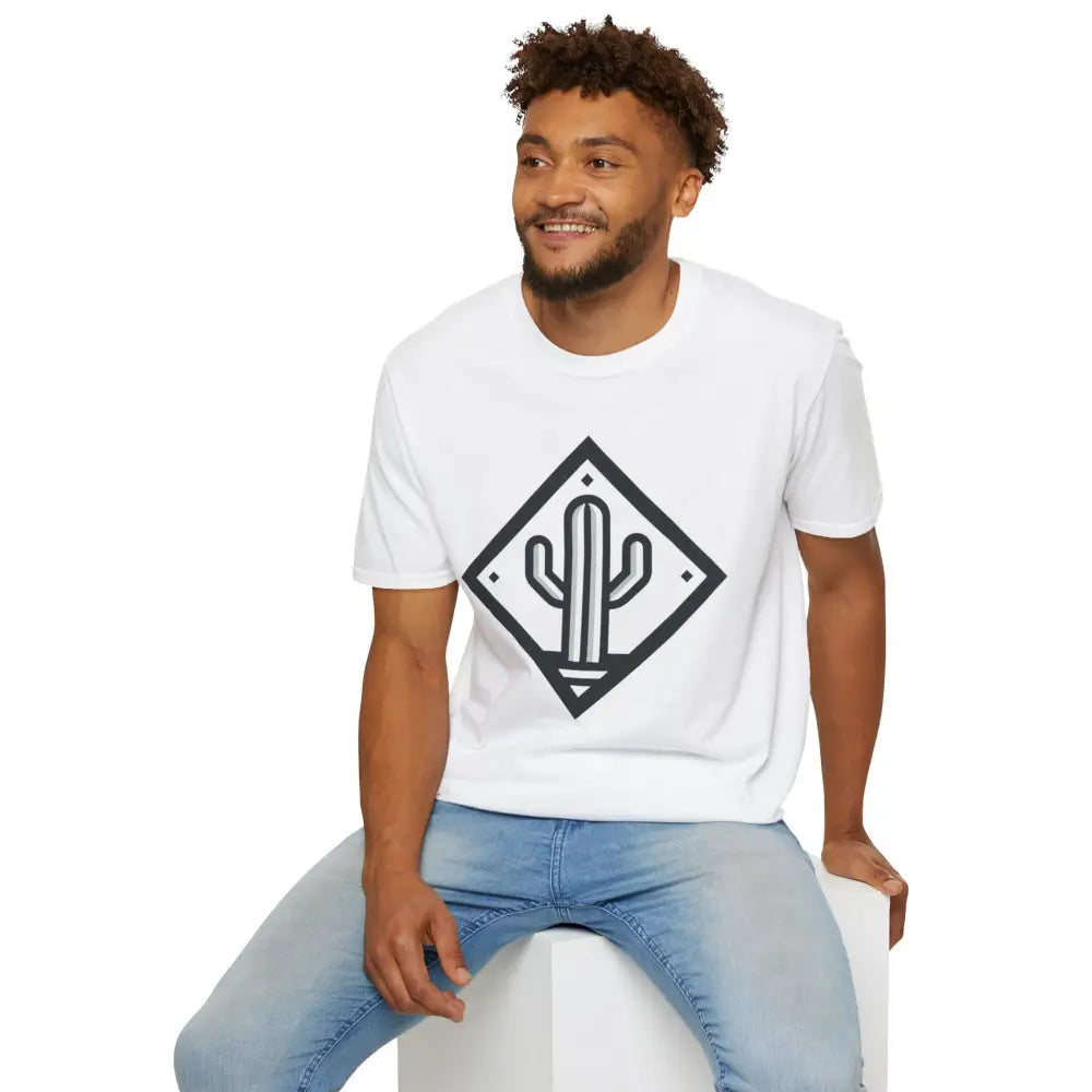 Man wearing white Cactus Adventure unisex T-shirt with black cactus design and light blue jeans, made from ring-spun cotton for ultimate comfort and reduced fabric waste
