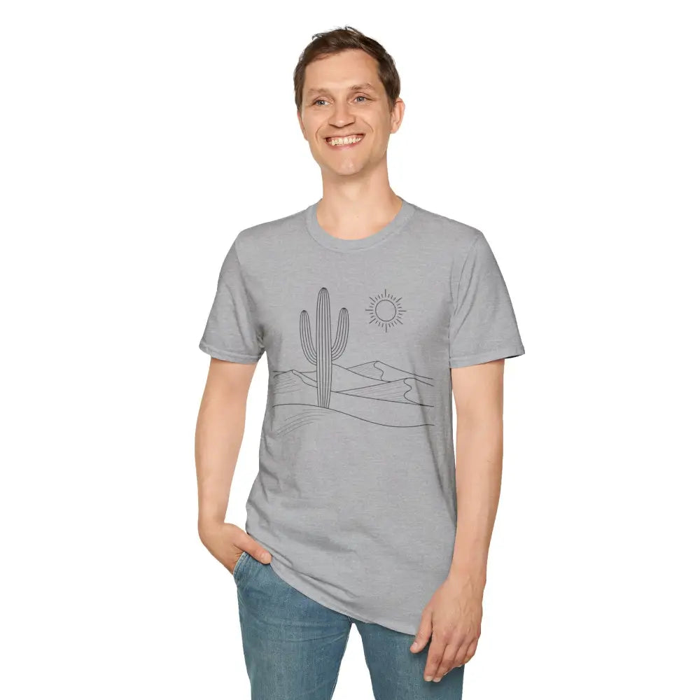 Man modeling Cactus Desert Vibes unisex t-shirt with desert landscape design and elastic ribbed collar