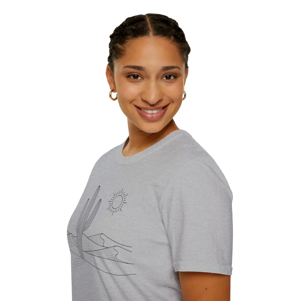Woman with braided hair wearing a desert scene graphic unisex t-shirt made of lightweight fabric with elastic ribbed collar