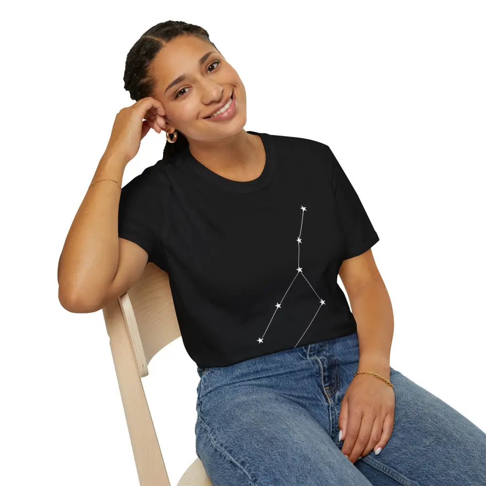 Woman in black unisex softstyle T-shirt with constellation graphic, ideal for astrology lovers