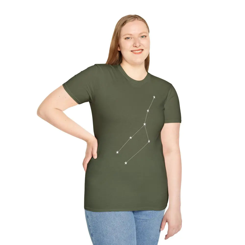 Woman wearing dark olive green unisex softstyle T-shirt with constellation graphic, cosmic vibe outfit