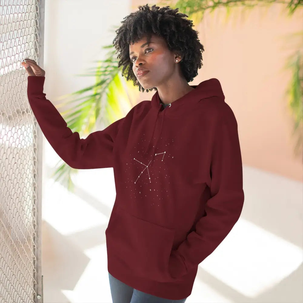Dark red celestial hoodie with constellation design, cozy fleece, adjustable hood, spacious kangaroo pocket