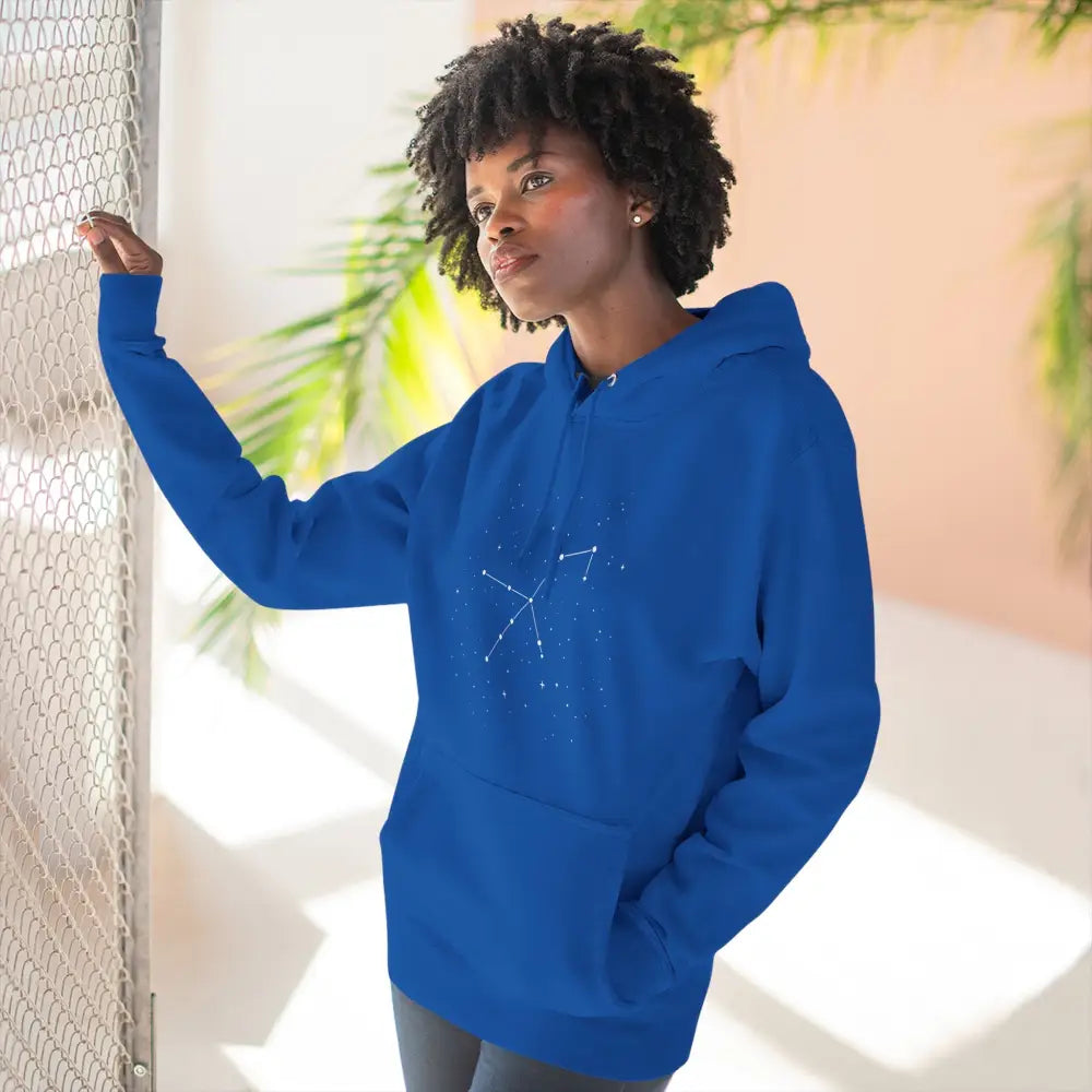 Royal blue cozy fleece hoodie with constellation graphic, adjustable hood, and spacious kangaroo pocket