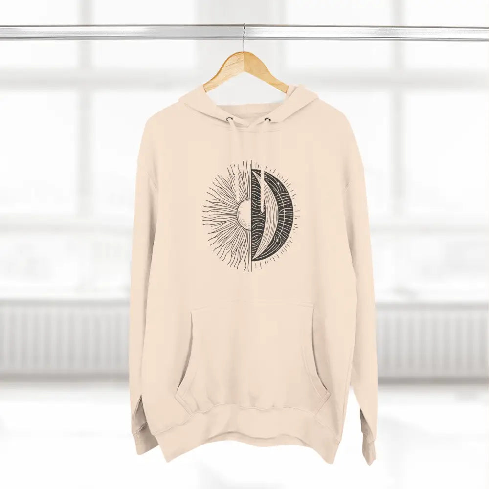 Light-beige cozy fleece hoodie with black sun and moon graphic, spacious kangaroo pocket