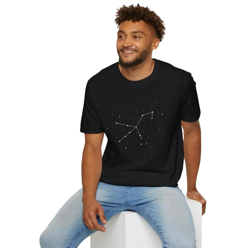 Man wearing a black Celestial Orion Constellation star lover tee and blue jeans