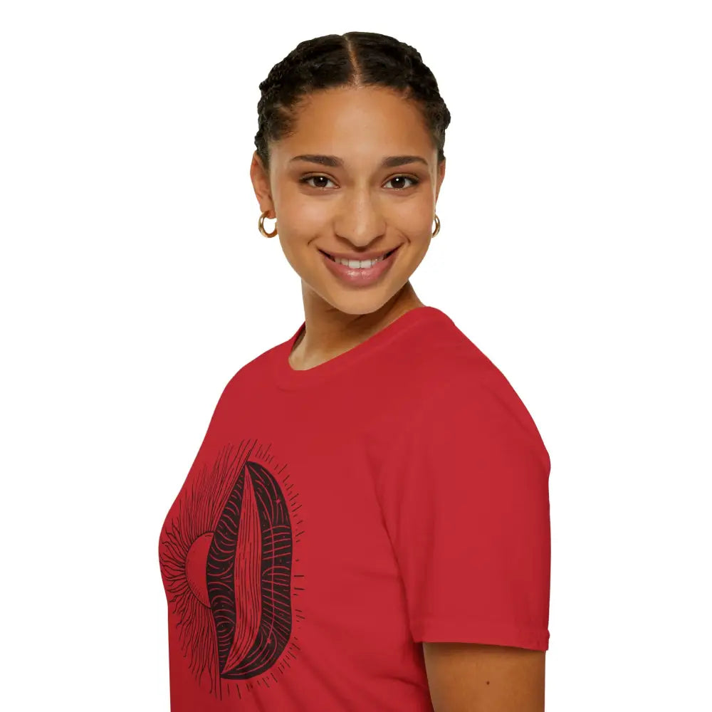 Smiling woman in a red unisex softstyle t-shirt with black abstract design and seamless fit