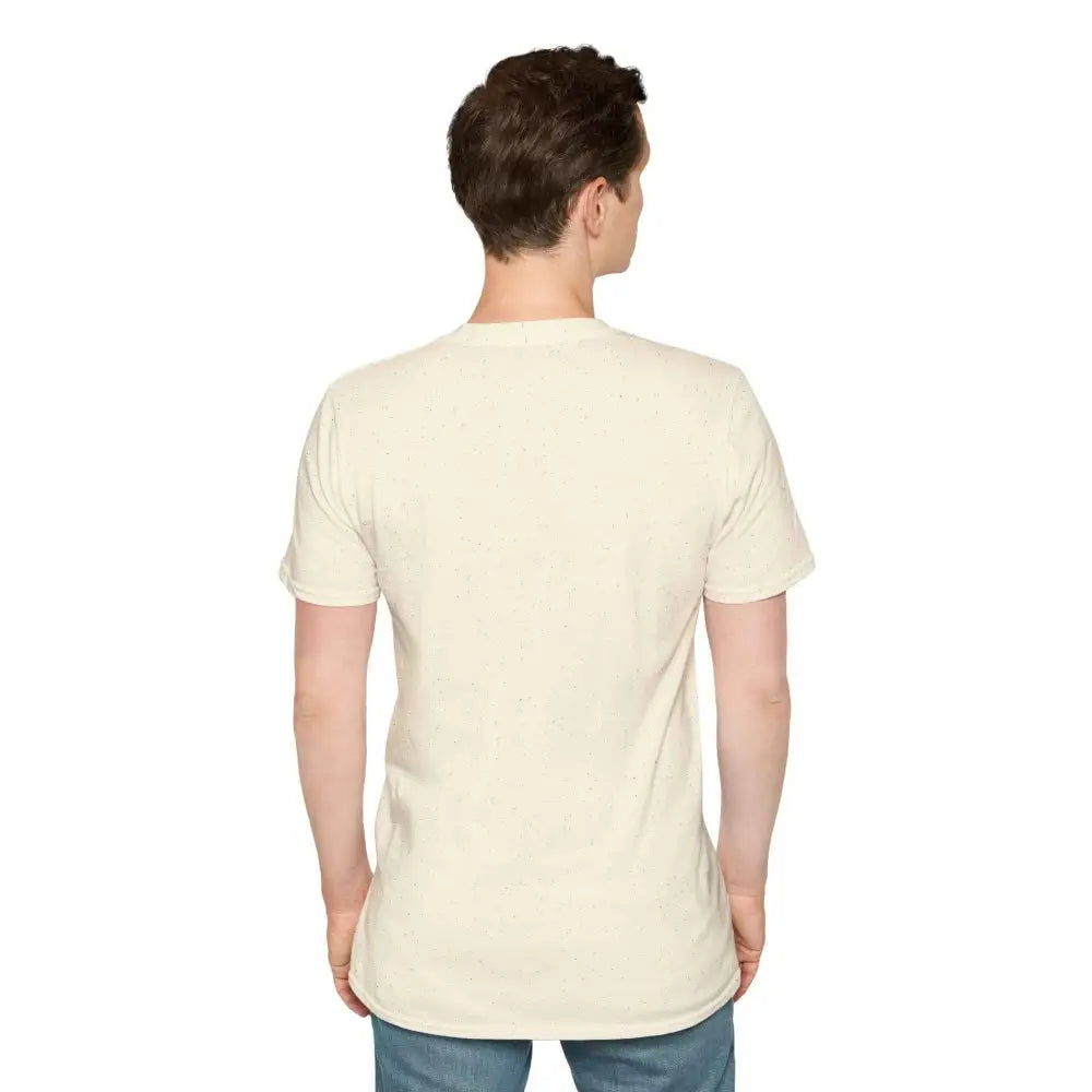 Man wearing a light beige unisex softstyle t-shirt with ribbed collar retains seamless design