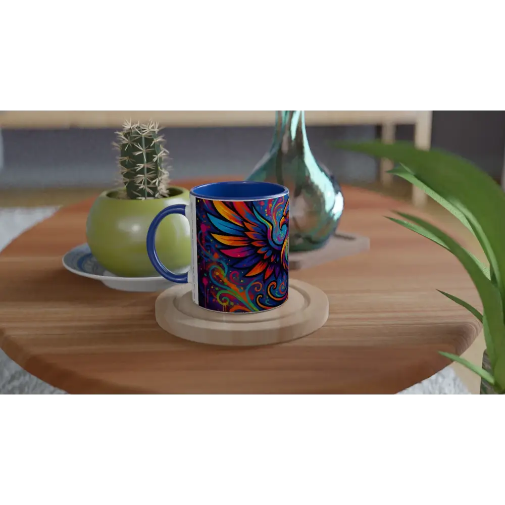 Colorful phoenix design on ceramic mug with vibrant neon flame colors for a rebirth theme