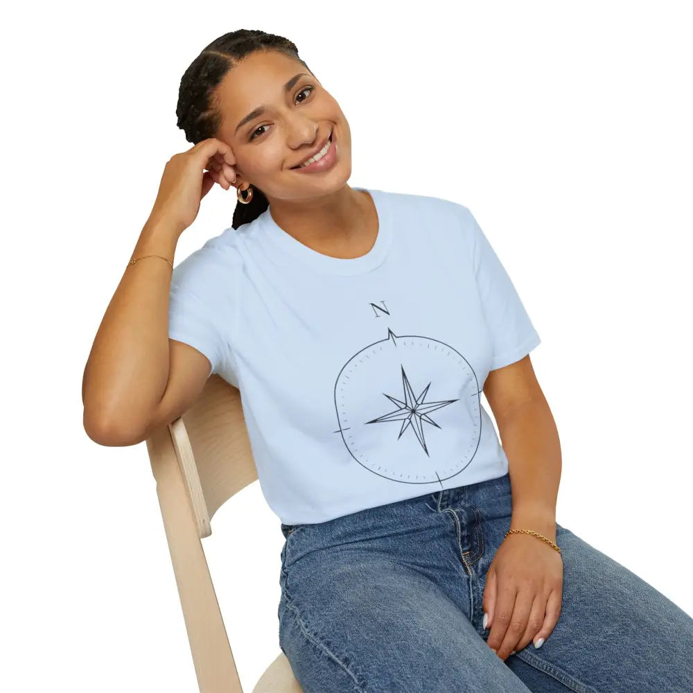 Woman wearing a light blue compass graphic T-shirt made of ring-spun cotton for outdoor activities