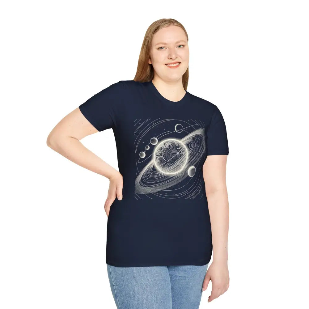 Woman wearing navy blue unisex softstyle t-shirt with mesmerizing cosmic design and celestial graphic