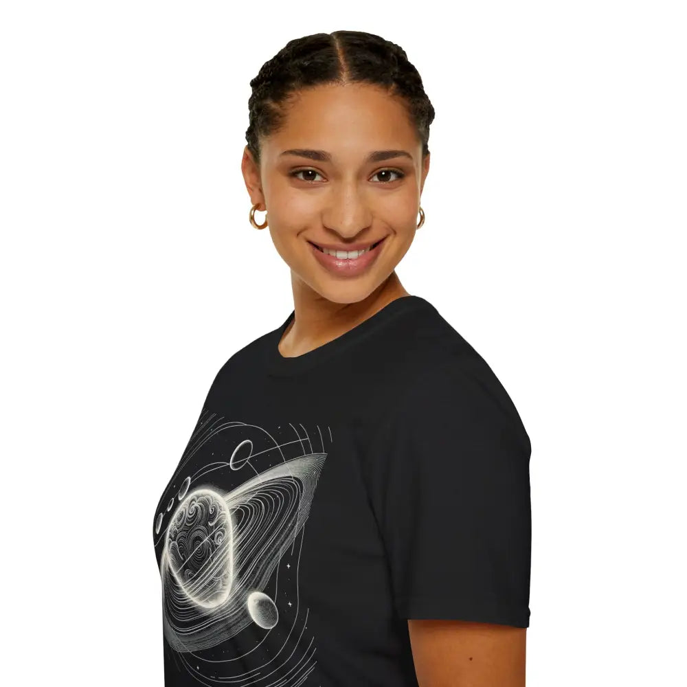 Woman wearing a black unisex softstyle t-shirt with mesmerizing cosmic design and celestial graphic print