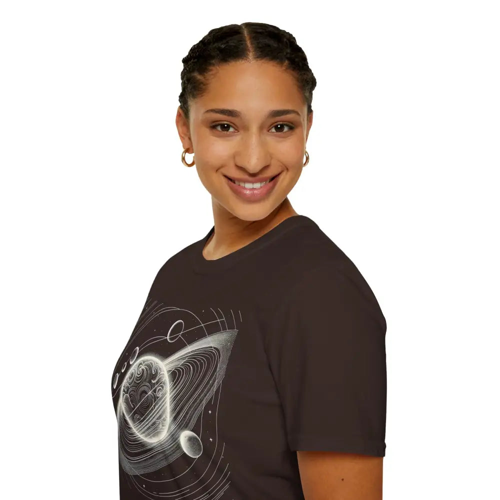 Woman wearing a unisex softstyle t-shirt with mesmerizing cosmic design and celestial graphic