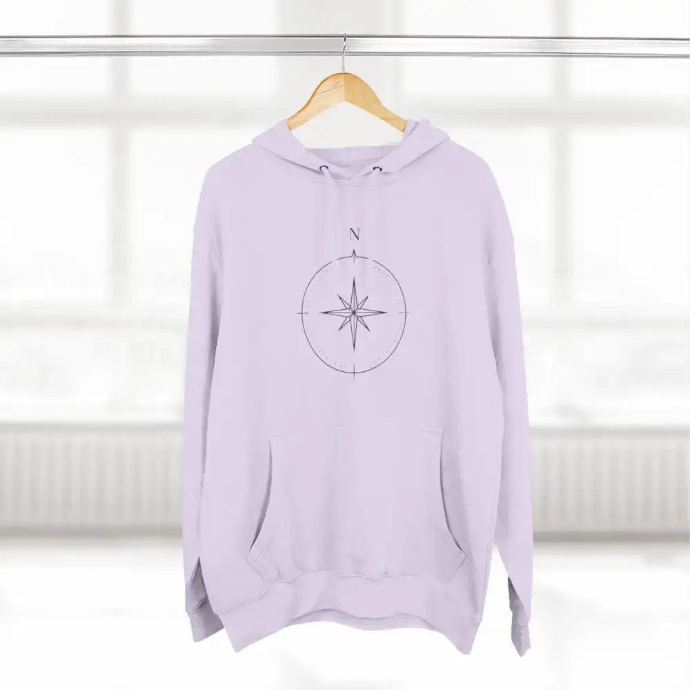 Light purple unisex hoodie with compass design, adjustable hood, low heat care instructions