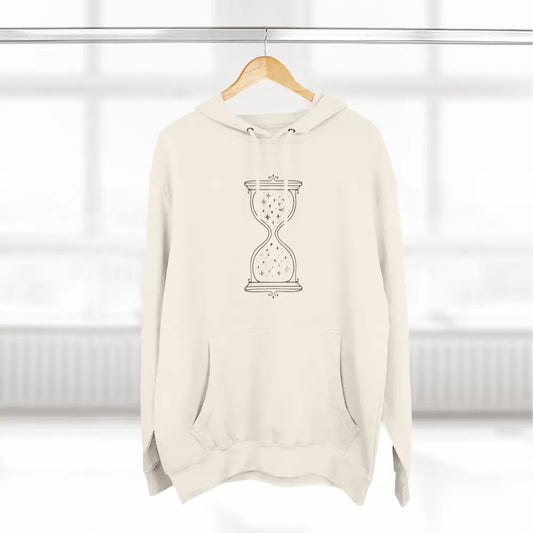 Cream-colored fleece hoodie with hourglass graphic, perfect for all seasons and easy care