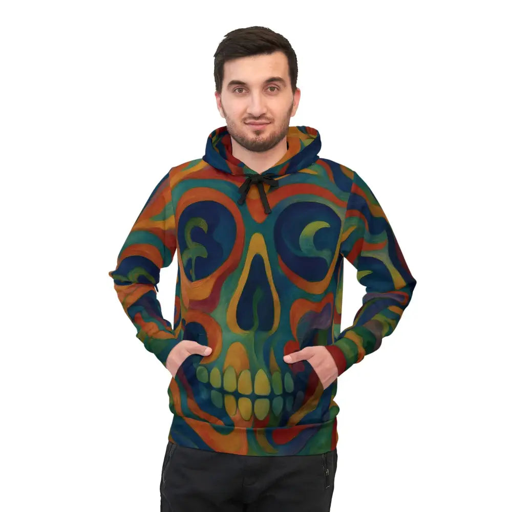 Man wearing a skull-patterned Psychedelic Skull Athletic Hoodie from PixiOnyx Festival Collection