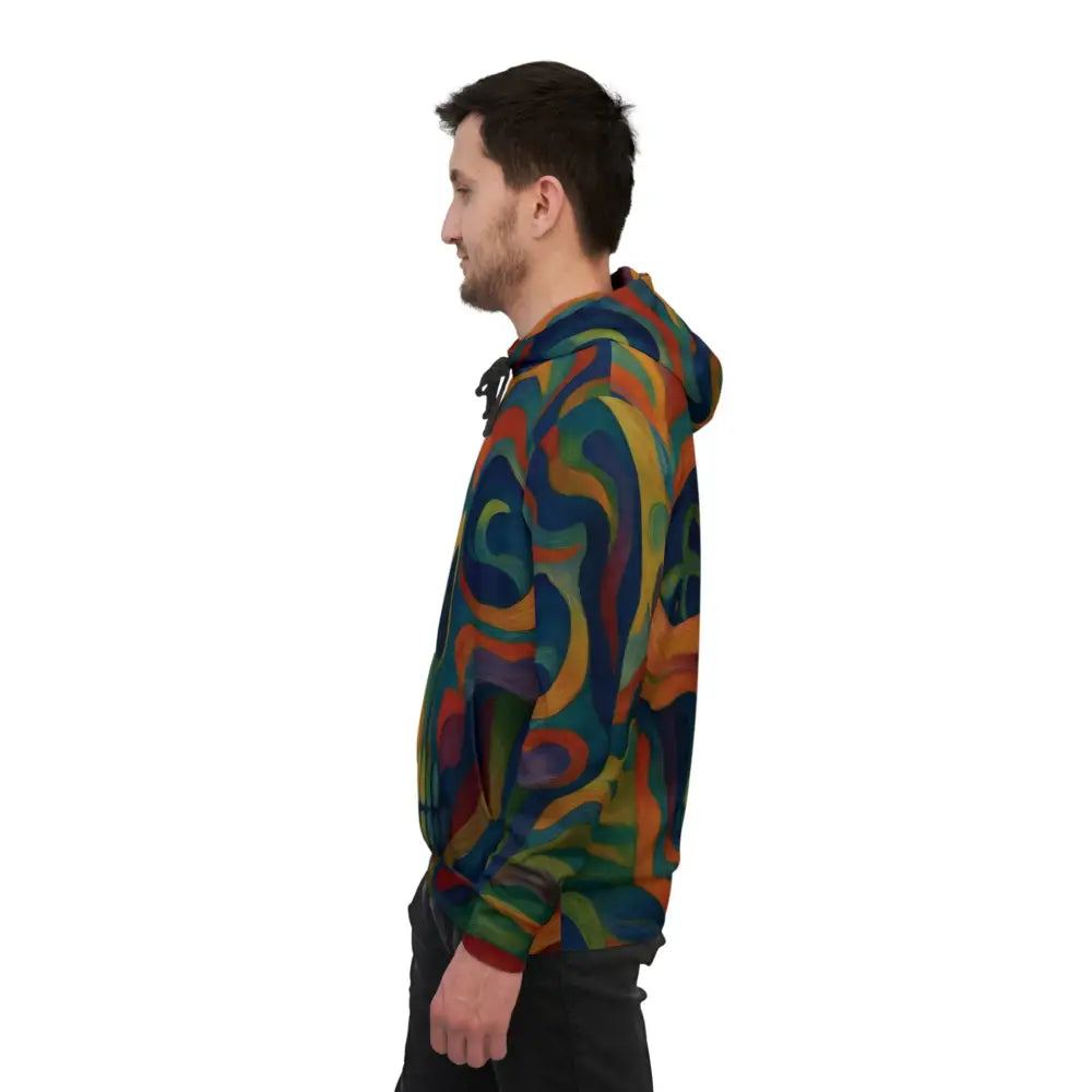 Man wearing colorful patterned hoodie from Craniocolor Psychedelic Skull Athletic Hoodie collection