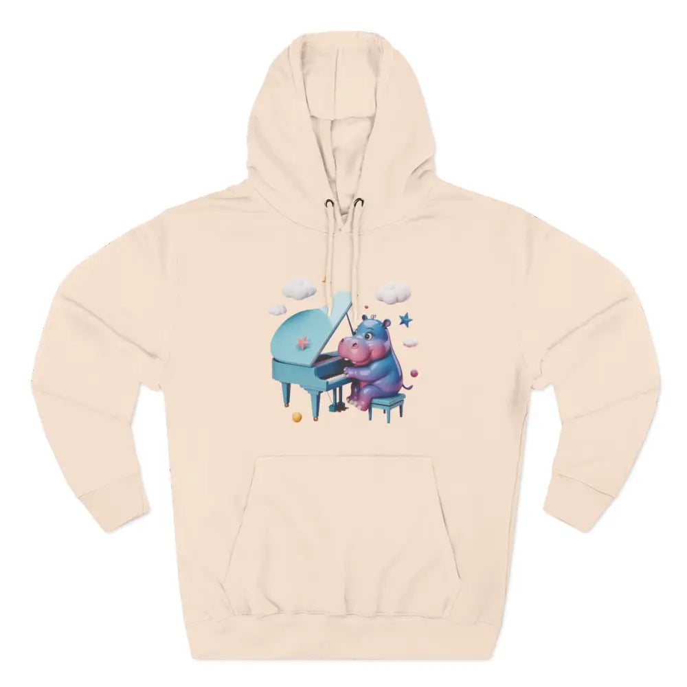 Cream-colored fleece hoodie with a cute hippopotamus playing a light blue piano, perfect for kids and teens