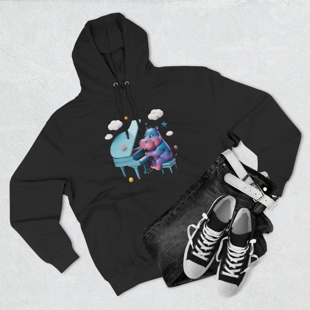 Black fleece hoodie with a cute cartoon hippo playing piano, perfect for music lovers
