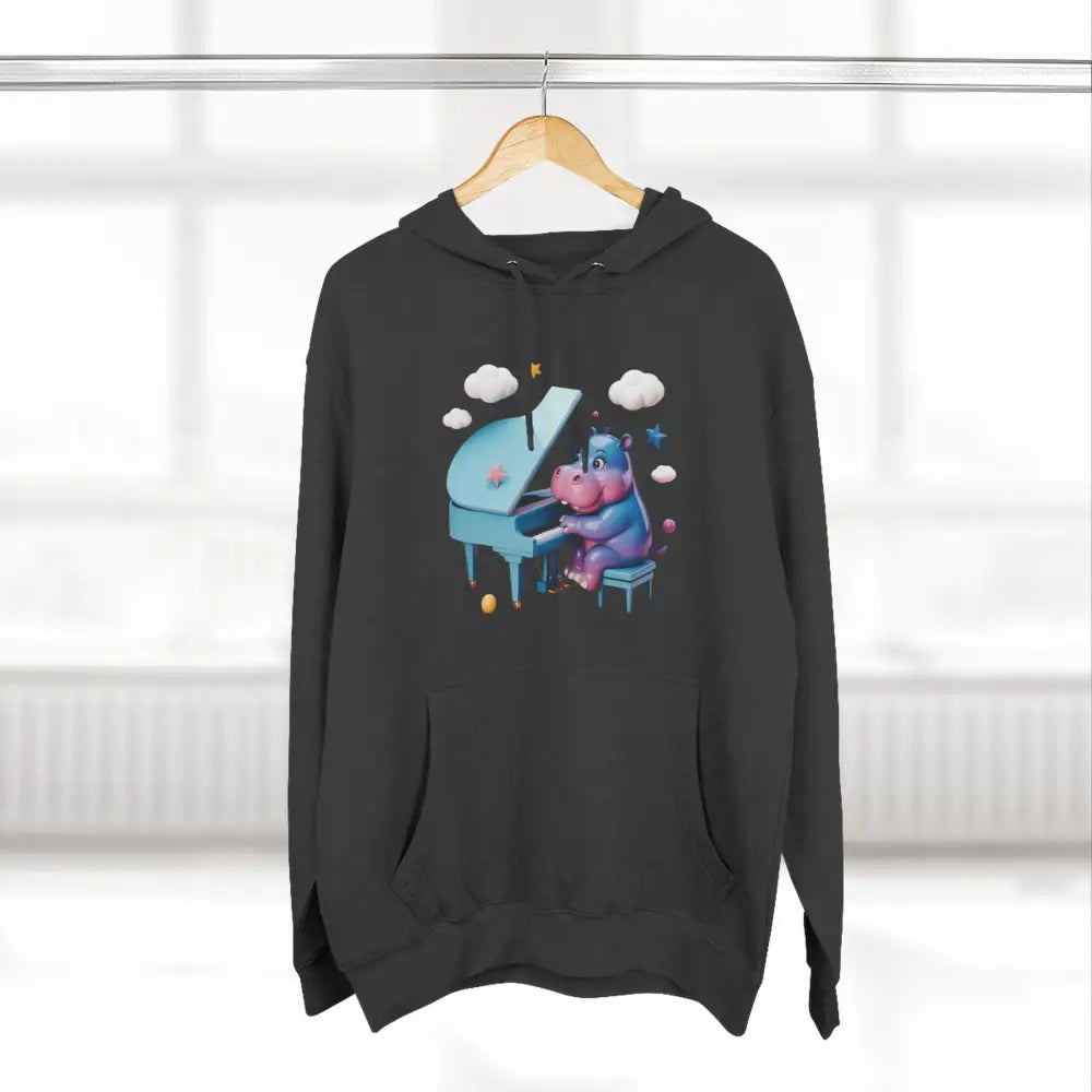 Black fleece hoodie with cartoon hippopotamus playing piano, cozy and delightful fleece hoodie for music lovers