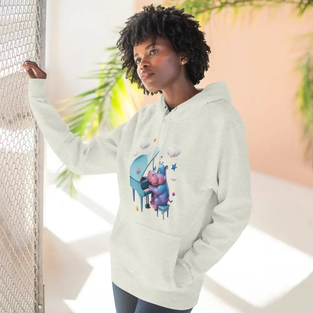 White fleece hoodie with a cartoon hippo playing piano, perfect for music lovers and kids
