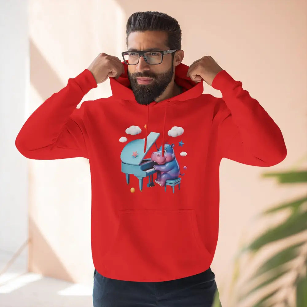 Red fleece hoodie with cartoon hippos playing a light blue grand piano, perfect for music lovers