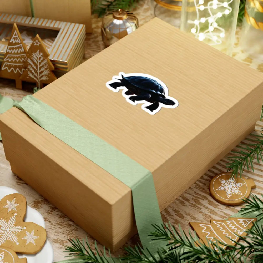 Wrapped gift box featuring the Dark Sea Turtle Abyssal Ocean Vinyl Sticker from PixiOnyx