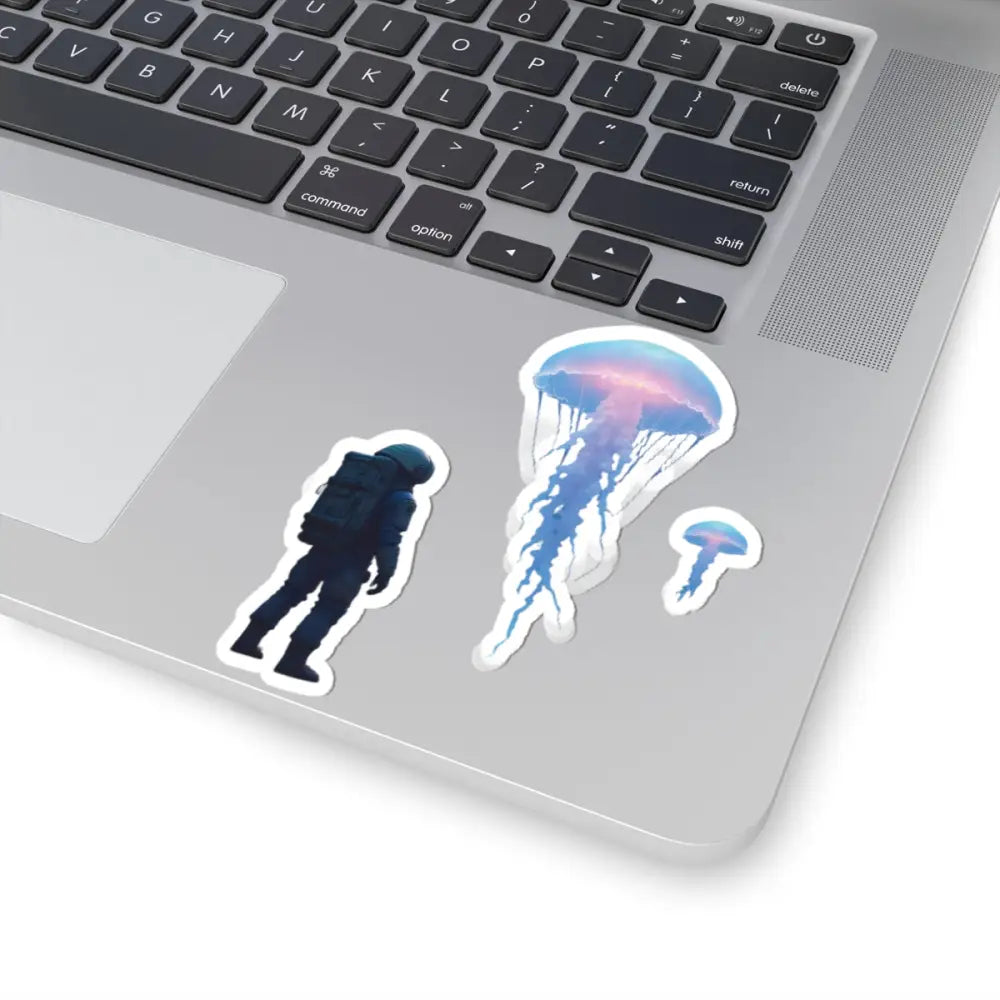 Laptop with astronaut and jellyfish stickers from Deep Drift Encounter Space Vinyl