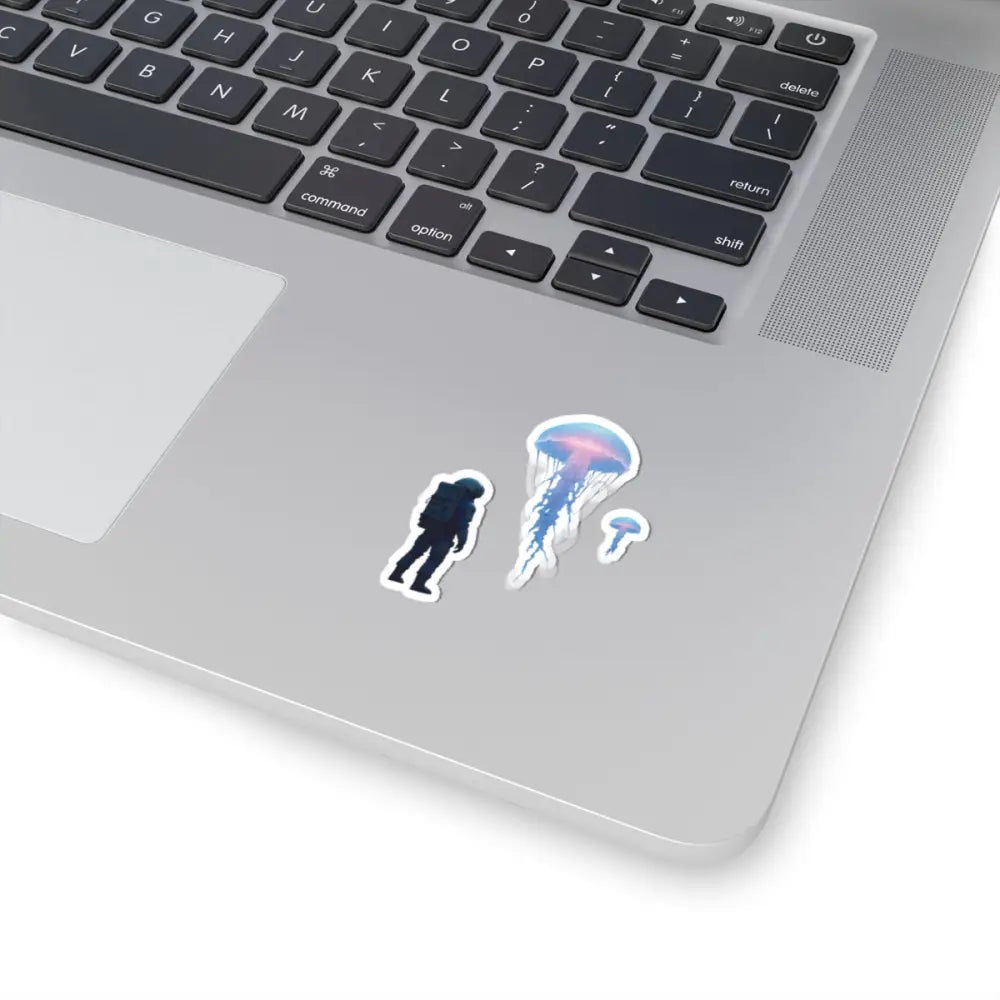 Laptop with astronaut and jellyfish stickers from Deep Drift Encounter Space Vinyl