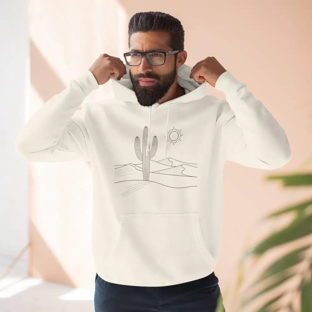 Man modeling desert landscape graphic on a three-panel fleece hoodie with spacious kangaroo pocket