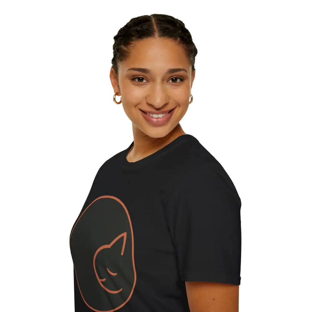 Woman wearing a black ring-spun cotton T-shirt with a peach-colored cat outline for cat lovers