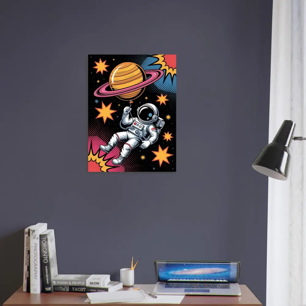 Spacewalker clutches Saturn with stars in the background on museum-grade 12-color giclée poster