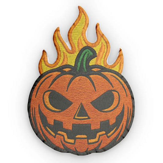 Embroidered flaming pumpkin patch on pumpkin shaped pillow for Halloween decor