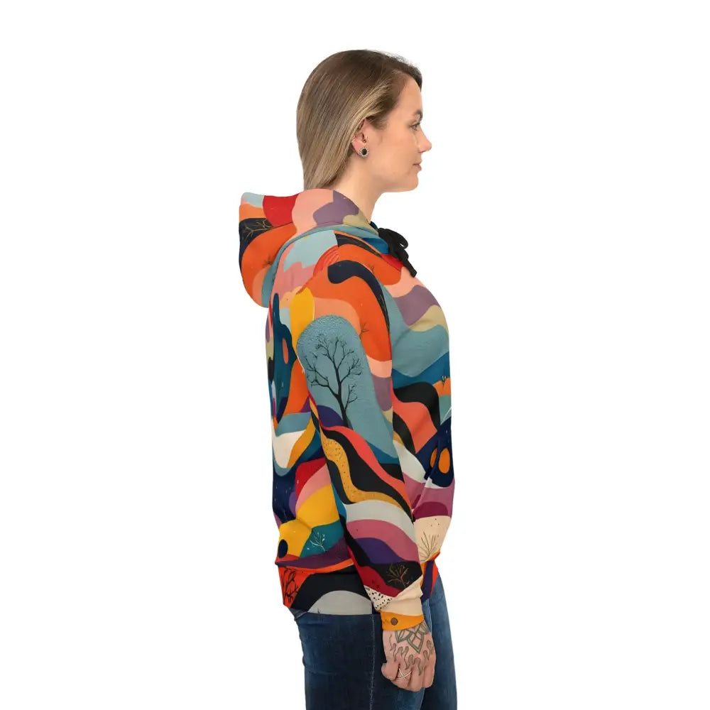 Colorful patterned hoodie with abstract nature-inspired design from Flowstate Mirage collection