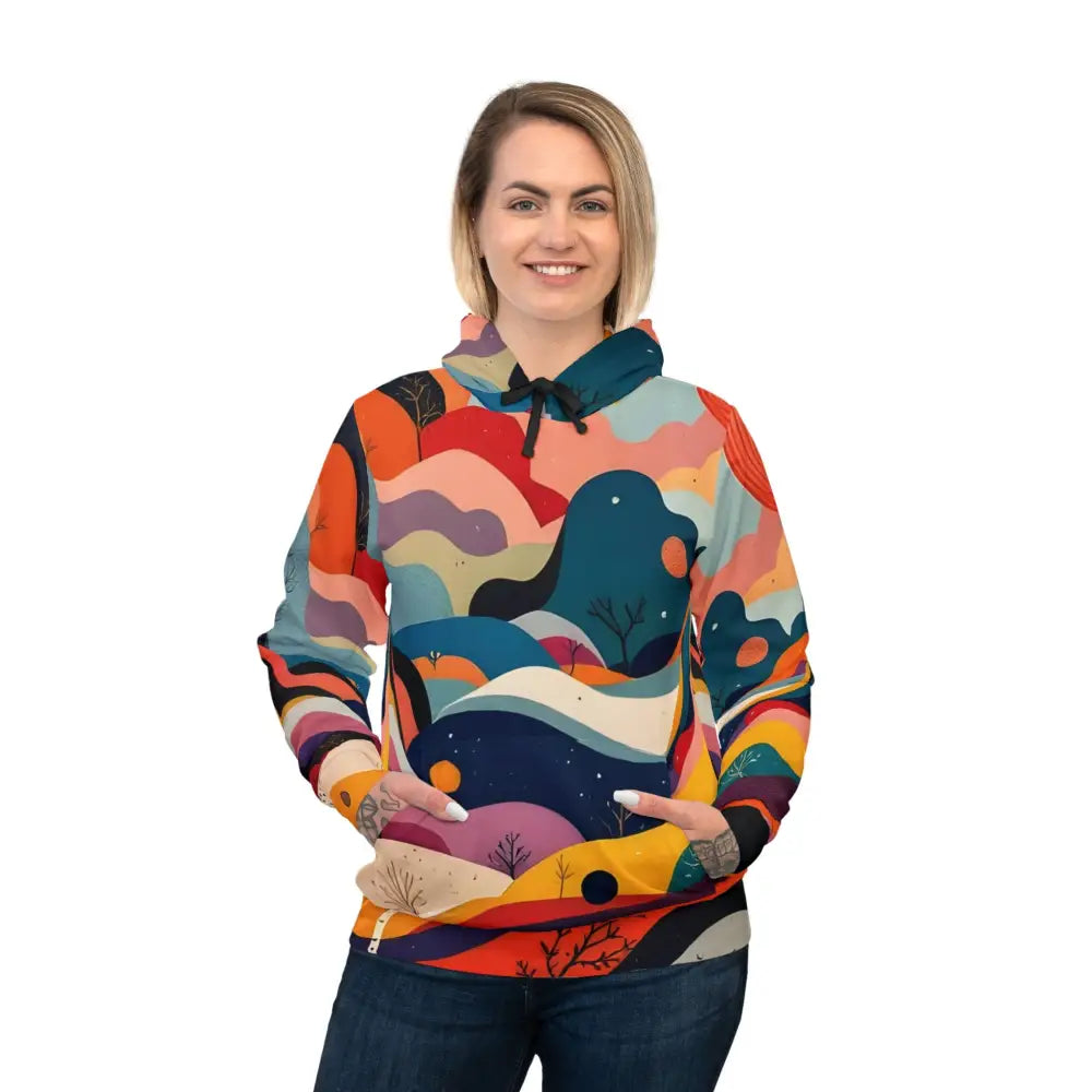 Woman wearing colorful patterned Flowstate Mirage Urban Camo Hoodie for festival wear