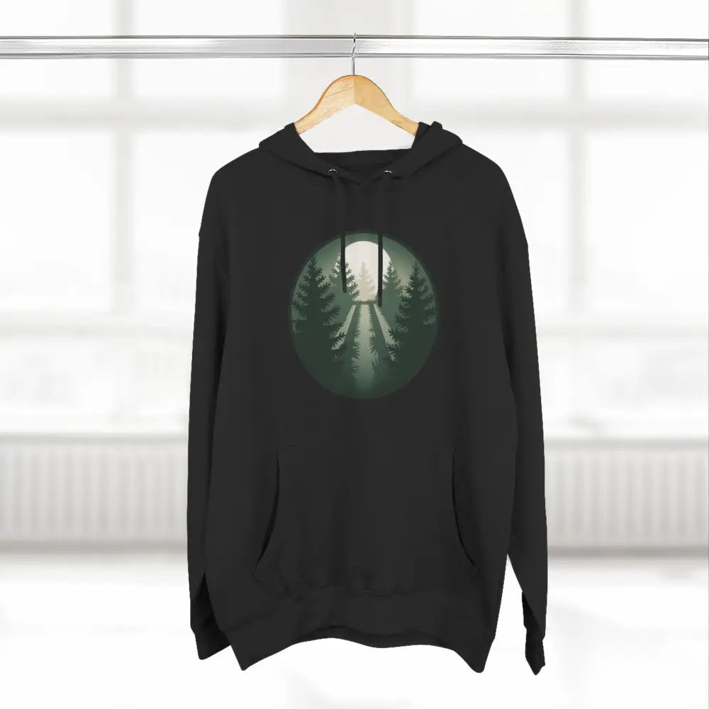 Black cozy fleece hoodie with forest and full moon graphic, soft fabric composition