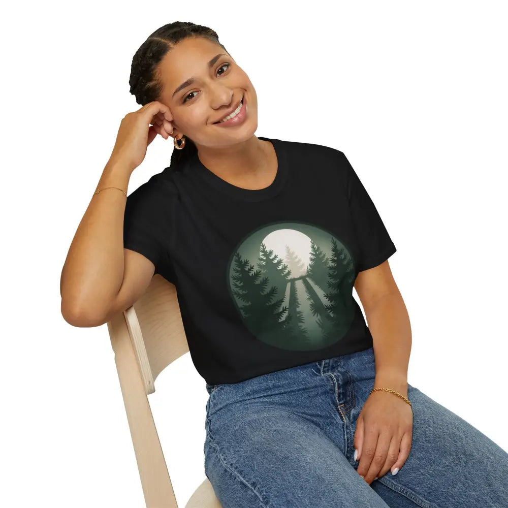 Woman modeling stunning unisex softstyle Forest Vibes T-Shirt with forest and moon design