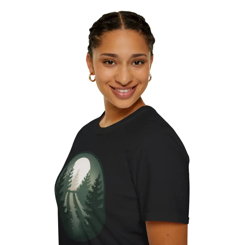 Smiling woman with braided hair wearing Forest Vibes stunning unisex softstyle T-shirt with forest and moon design