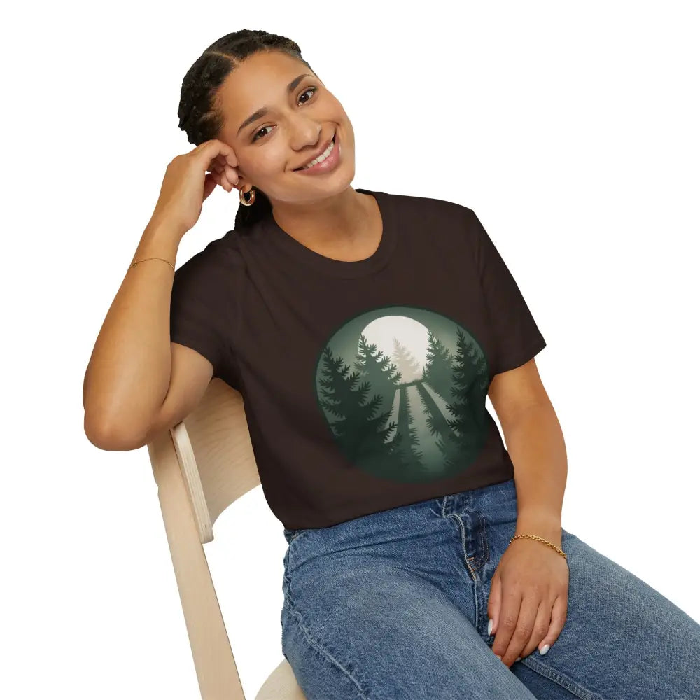 Woman modeling stunning unisex softstyle Forest Vibes T-Shirt with forest and full moon graphic