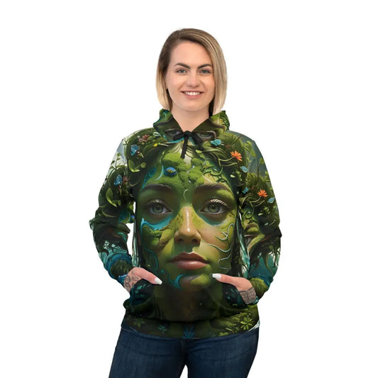 Woman wearing a green nature-inspired hoodie from PixiOnyx Eco Art Apparel