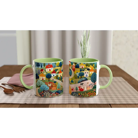 Hillside Harmony green accent ceramic mug with colorful village and nature scene