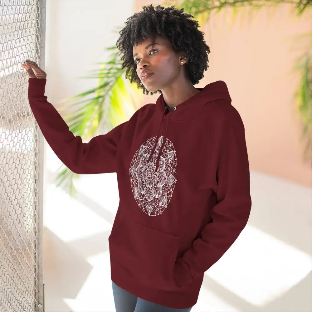 Maroon three-panel fleece hoodie with white mandala design and adjustable hood for cozy comfort