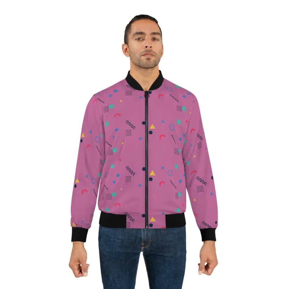 Man in a pink patterned Memphis Razzle Pop bomber jacket by PixiOnyx Retrocore Outerwear