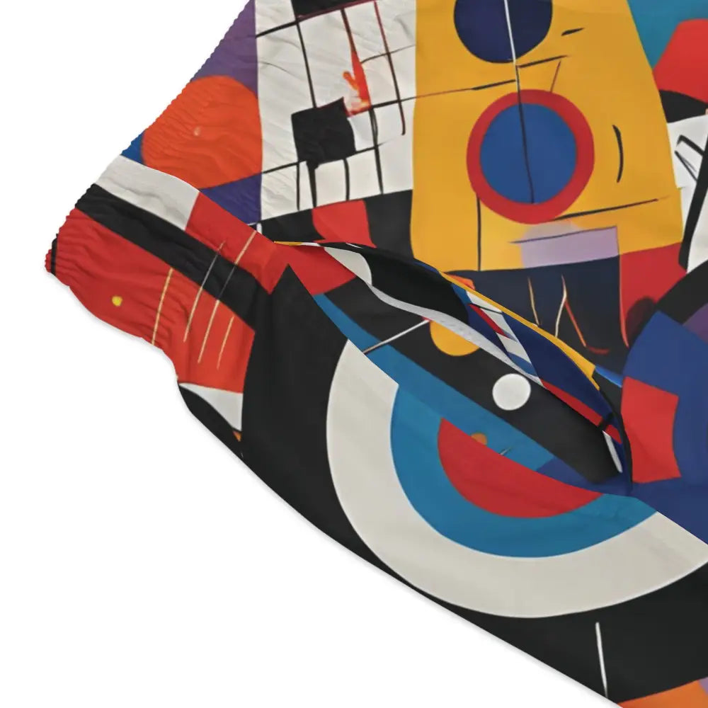 Abstract patterned men’s swim trunks with dynamic motion design from PixiOnyx