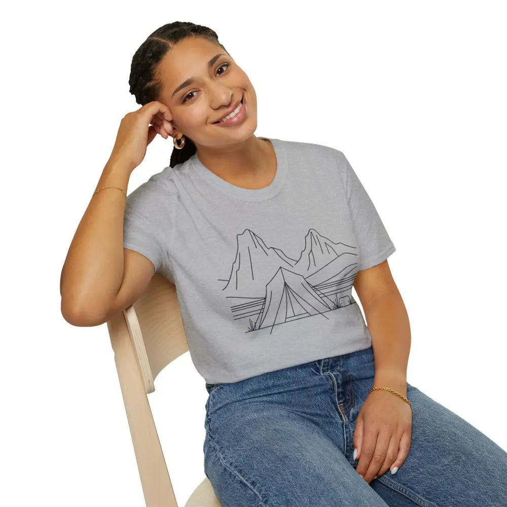 Woman modeling a stylish unisex t-shirt with mountain and tent graphic in ring-spun cotton