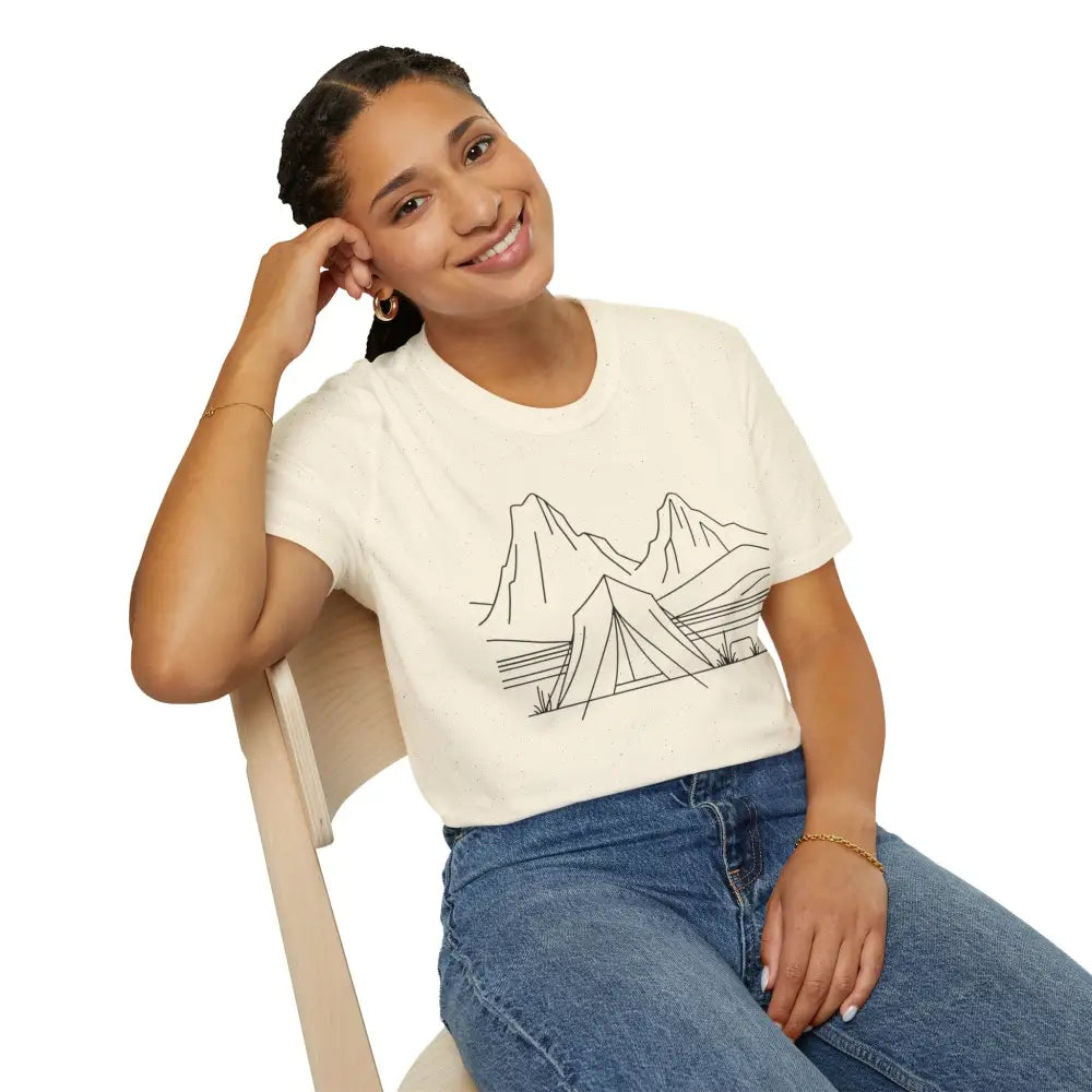 Woman wearing a stylish unisex t-shirt with mountain and tent graphic made from ring-spun cotton